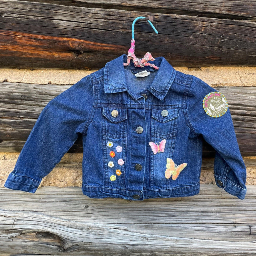 Front of jean Jacket with flower and butterfly patches