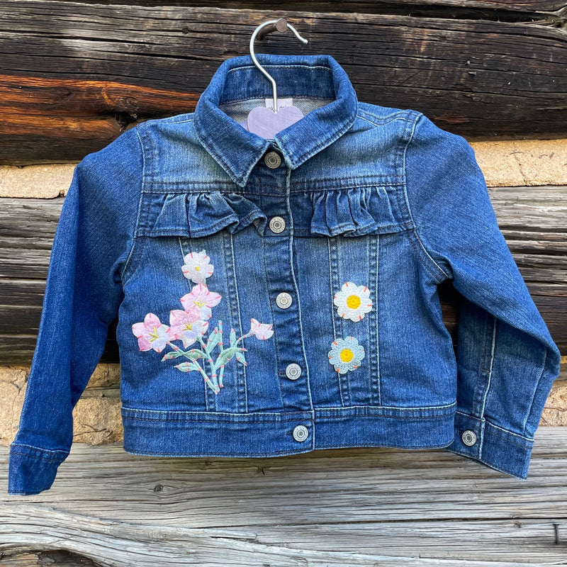 Front of Jean Jacket with flower patches.