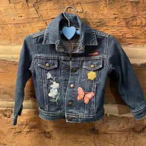 Denim jacket with floral and butterfly patches 