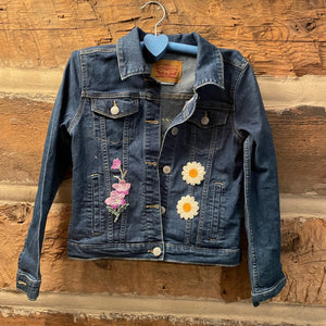 Denim jacket with floral patches 
