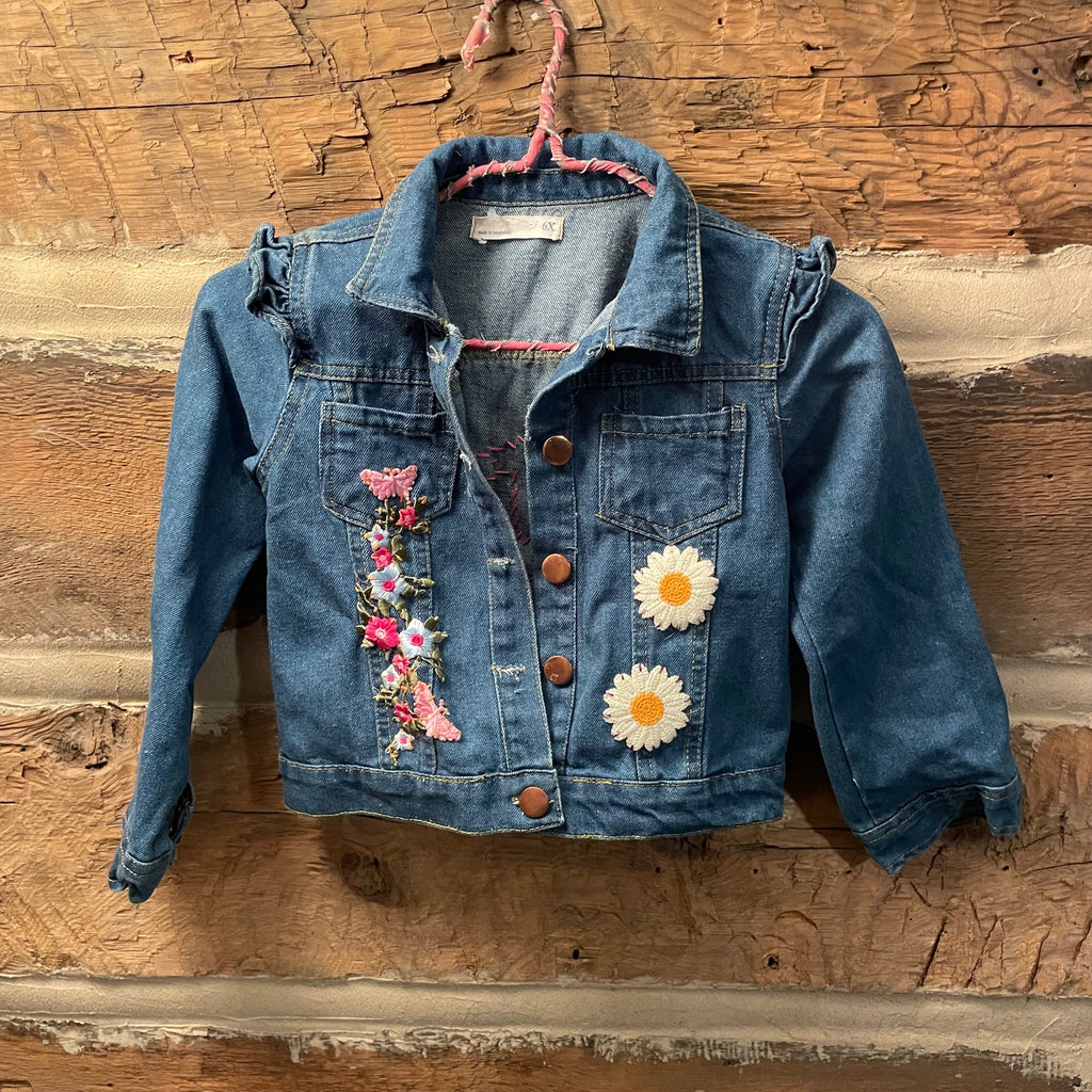 Denim jacket with floral patches