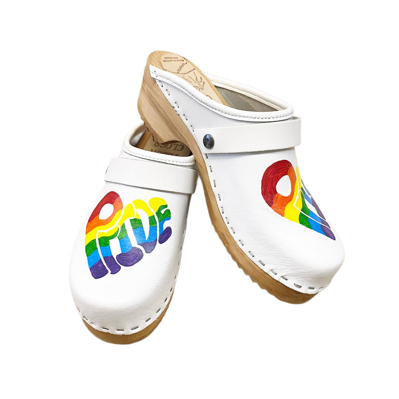 Traditional heel white leather with rainbow pride heart and white snap strap