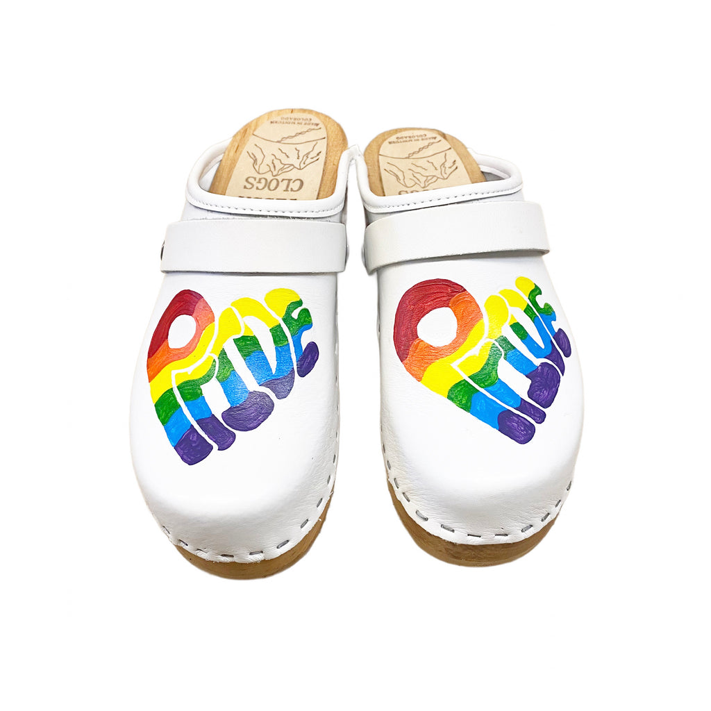 Traditional heel white leather with rainbow pride heart and white snap strap