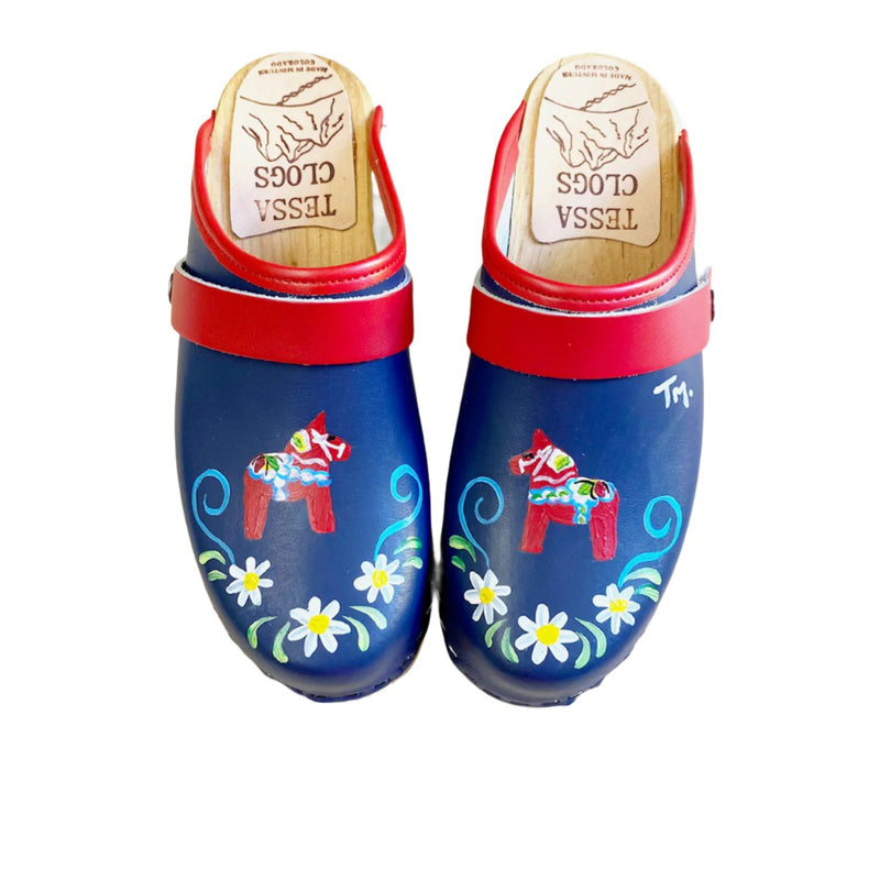 Mountain Sole Clog with blue leather and handpainted Dalahorse design featuring a red edgeband and red snap straps