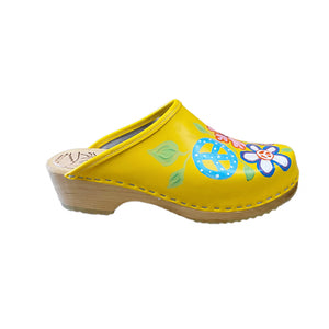 Right foot for the Yellow Christy Peace Design clogs on the traditional heel.