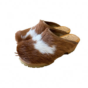 Tan and White furry calf hide mountain clogs