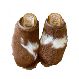 Tan and White furry calf hide mountain clogs