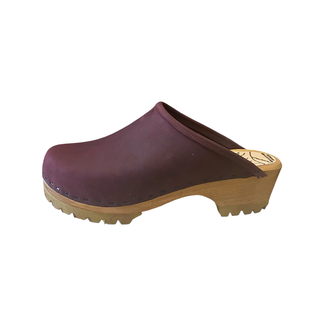 Side view of the traditional mountain sole clog in the Merlot leather.