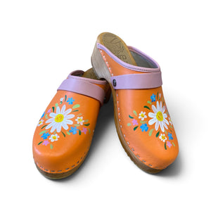 Orange clogs with hand painted flower design