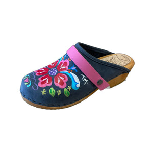 Traditional heel Tessa clog in denim blue leather and natural wood stained soles with the hand painted Petra design and a plain hot pink snap strap.