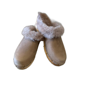 Traditional heel Tessa clogs in Tobacco oil tanned leather with Taupe shearling insole and edge band as well as decorative nails along base of shoe.