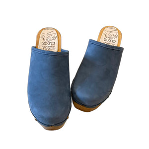 Ultimate High clog with blue denim leather and decorative nails.