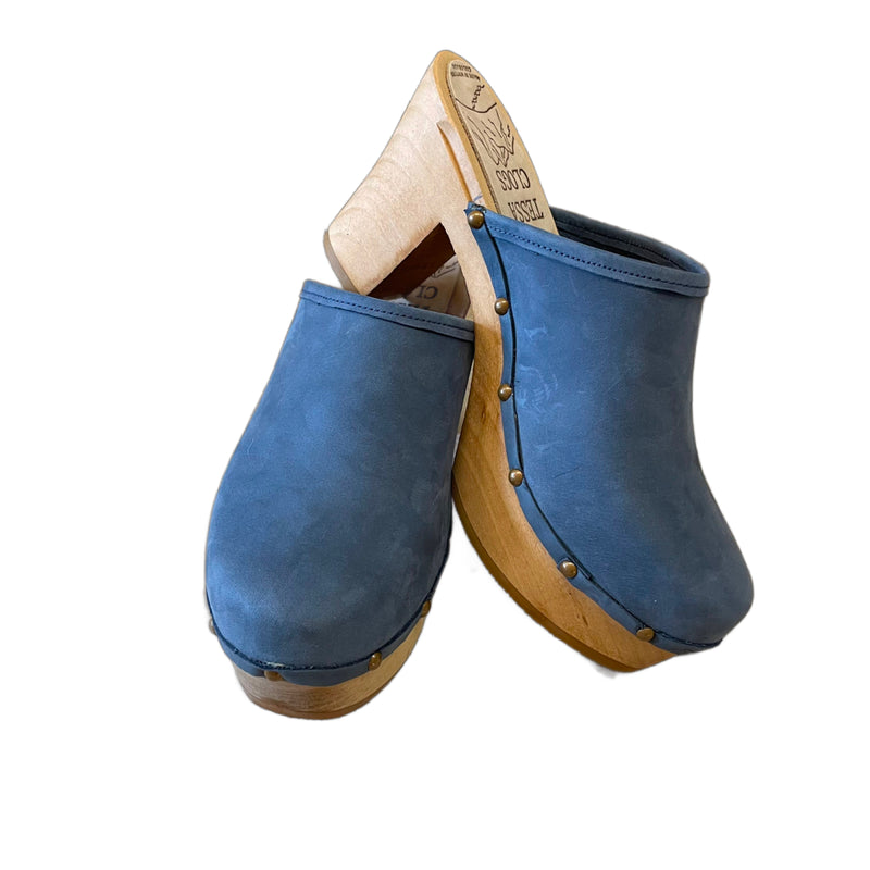 Ultimate High clog with blue denim leather and decorative nails.