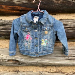 Denim jacket with flower patches