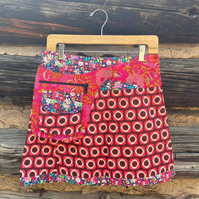 Asha Reversible Wrap Skirt with pink geometric pattern side B.