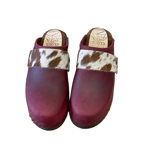 burgundy leather with spotted cow strap and brown wooden soles