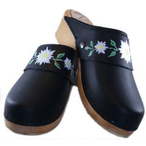 Black traditional heel clogs with hand painted Edelweiss snap strap